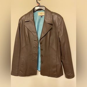 Brown, leather women’s jacket.
